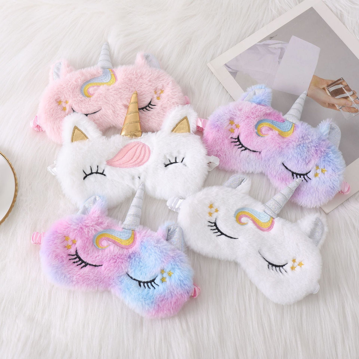 Ladies nan cozy unicorn sleep mask with embroidered eyelashes, soft plush and elastic ruffled ribbon 
Maetiva