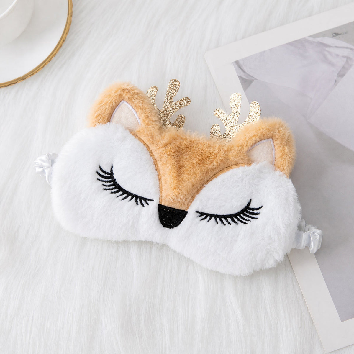 Ladies nan cozy unicorn sleep mask with embroidered eyelashes, soft plush and elastic ruffled ribbon 
Maetiva
