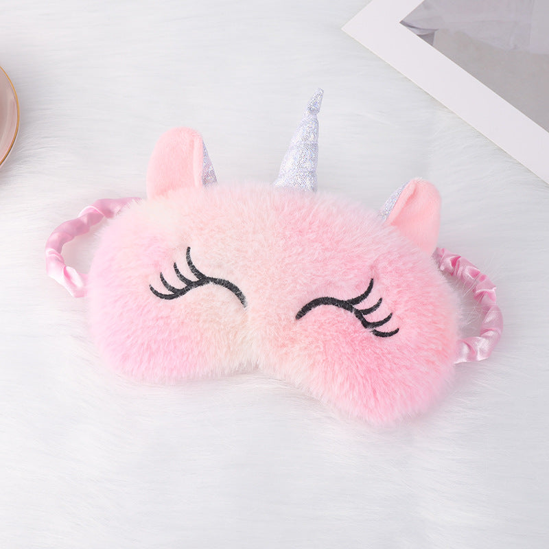 Ladies nan cozy unicorn sleep mask with embroidered eyelashes, soft plush and elastic ruffled ribbon 
Maetiva