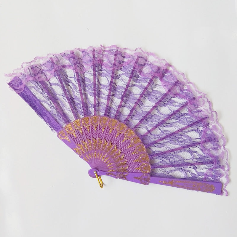 Women's fan made of fine lace with elegant gold embellishment 
Maetiva